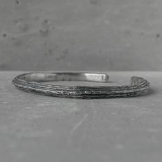 Orbit bangle- thin silver cuff bracelet with unusual hancrafted texture Bracelets Project50g Orbit Ring, Mens Bracelet Silver, The One Show, The Milky Way, Textured Design, Unique Bracelets, Bracelet For Men, Silver Cuff Bracelet, Special Price