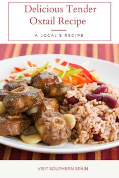 delicious tender oxtail recipe with rice and beans on a white plate in front of a colorful table cloth