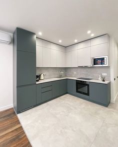 the kitchen is clean and ready for us to use in its new owner's home