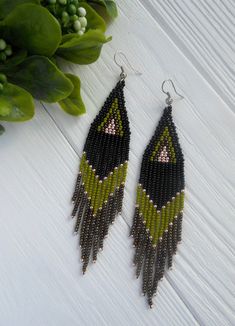 Elegant Green Chandelier Earrings With Colorful Beads, Elegant Green Beaded Chandelier Earrings, Elegant Green Long Drop Beaded Earrings, Green Long Drop Jewelry With Dangling Beads, Green Chandelier Earrings With Dangling Beads As A Gift, Green Beaded Long Drop Jewelry, Handmade Green Beaded Long Drop Earrings, Dark Green Beaded Jewelry Gift, Dark Green Beaded Jewelry For Gift