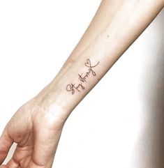 a woman's arm with a tattoo that says, love and faith on it