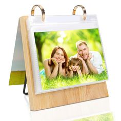 an easel with a family photo on it