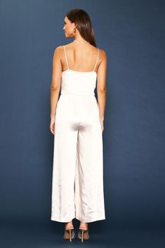 This strappy cowl-neck jumpsuit is a chic statement for this season's special occasions. It's got a beautiful drape up top and a breezy wide-leg silhouette. •Cowl neckline  •Adjustable spaghetti straps  •Pleated front  •Wide-leg silhouette  •Hidden zipper at back  Item Number: 74292