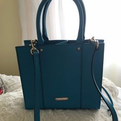 This Rebecca Minkoff Purse Is Brand New Without Tags And Has Never Been Worn. It Has A Detachable Strap And Wallet That Comes With It.( Offers Are Welcome) Blue Satchel For Office, Blue Office Bag With Zipper Closure, Blue Crossbody Satchel With Gold-tone Hardware, Elegant Blue Satchel With Zipper Closure, Chic Blue Satchel With Zipper Closure, Trendy Blue Bags With Gold-tone Hardware, Rebecca Minkoff Crossbody Bag, Red Crossbody Bag, Feed Bags