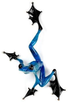 a blue glass figurine with black stars on it's legs and feet