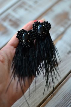 Black feather heart earrings Natural ostrich tassel Watterfall beaded crystal clip on earrings Bohemian boho Statement beadwork jewelry Unique Beaded Wedding Earrings, Elegant Feather Dangle Jewelry, Bohemian Feather Earrings For Party, Elegant Silver Feather Earrings, Handmade Party Clip-on Earrings, Elegant Feather Dangle Earrings, Elegant Dangle Feather Earrings, Elegant Dangle Earrings With Feathers, Bohemian Party Jewelry With Feathers