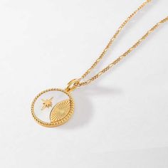 Inspired by vintage coins found in East Asia, these modern-day talismans carry icons of good fortune. The Solar Necklace, with a microcosmic galaxy of sun, star, and a moon symbolises dreams and aspirations for the future. In the world of feng shui, pearl is believed to symbolize wealth and good luck. You go, girl. Det Luxury Gold Necklace With Pearl Pendant, Luxury Gold Chain Necklace With Pearl Pendant, Elegant Medallion Necklace On Clavicle Chain, Elegant Gold-tone Medallion Necklace With Adjustable Chain, Luxury Gold-tone Pendant Necklace, Luxury White Clavicle Chain Necklace, Elegant White Coin Necklace With Round Pendant, Luxury Gold-plated Silver Necklace, Elegant White Round Pendant Coin Necklace