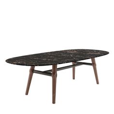 an oval table with black marble top and wooden legs