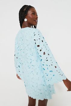 Make a graceful statement in the Aqua Floral Lace Camilla Dress. A mini crafted from embroidered fabric with cut-out details, this feminine style has flirty details such as the unlined long sleeves and scalloped hem. Perfect for warm-weather brunches, bridal showers, and luncheons, this stunning number pairs nicely with simple heels and jewelry. Round neck Unlined long bell sleeves Back zip closure Shift silhouette Scalloped hem Embroidered fabric with cut-out detail Mini length Lined Material: Spring Evening Dress With Cutwork Hem, Blue Scalloped Lace Mini Dress For Spring, Blue Mini Dress With Scalloped Lace For Spring, Spring Brunch Dresses With Scalloped Edges, Spring Brunch Dress With Scalloped Edges, Chic Long Sleeve Mini Dress With Scalloped Lace, Fitted Long Sleeve Dress With Scalloped Edges, Elegant Long Sleeve Dress With Cutwork Hem, Long Sleeve Mini Dress With Scalloped Lace For Brunch