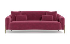 a pink couch with four pillows on the back and one arm upholstered to it