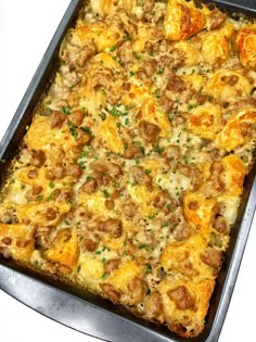 a casserole dish with sausage and cheese