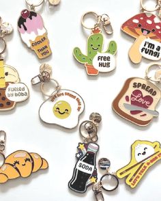 several key chains with different designs on them