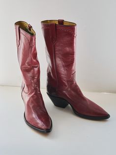 New Vintage - Men's Dress Western Style Boots. Size 11-D - 15" Shaft -  Designed by Paul Bond. Made in USA.  Riding Heel 2.5".  Top shaft outer circumference - 15"  This striking exotic cowboy boot is a find for someone who seeks originality and style. Featuring calf skin hand-lasted in a timeless cowboy profile with lizard skin heel.  An angled heel and signature Paul Bond  hand-embroidered calfskin shaft complete the elegant exotic profile. Exotic boots are an investment, and caiman is a wise Red Goodyear Welted Boots For Formal Occasions, Classic Red Boots For Formal Occasions, Classic Red Goodyear Welted Boots, Burgundy Snip Toe Boots For Formal Occasions, Classic Red Snip Toe Boots, Red Western Boots For Formal Occasions, Mens Western Style, Wise One, Skin Hand