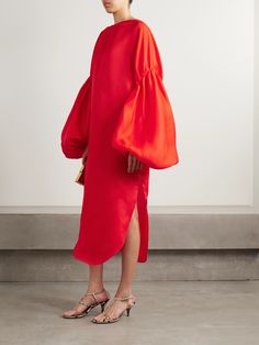 While able to be captured beautifully in images, the draping throughout Khaite's Spring '24 collection only feels more elegant in motion. This 'Zelma' dress is made from vibrant red silk that's gathered along the along the bubble sleeves for plenty of added volume. The splits in the curved hem reveal flashes of leg as you walk. Silk Midi Dress, Red Midi Dress, Silk Slip, Knitwear Tops, Red Silk, Clothes Collection, Vibrant Red, Jeans Dress, Net A Porter