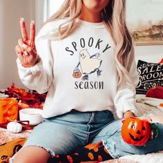 FREE SHIPPING On U.S. orders over $50.00! Use coupon code FREEOVER50 Ready for Spooky Season?! This Halloween Sweatshirt is exactly what you've been looking for! Our unisex heavy blend crewneck sweatshirt is pure comfort. These garments are made from polyester and cotton. This combination helps designs come out looking fresh and beautiful. The collar is ribbed knit, so it retains its shape even after washing. There are no itchy side seams on these sweaters. * 50% cotton, 50% polyester * Pre-shru Spooky Hoodie, Boho Halloween, Ghost Tee, Halloween Crewneck, Boo Shirts, Halloween Mummy, Teachers Halloween, Comfy Leggings, Halloween Sweater