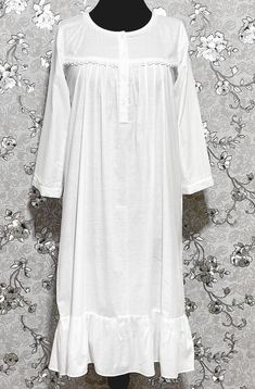 Embrace timeless sophistication with the SoieRose 100% Cotton 3/4 Sleeve Victorian Vintage Nightgown. Crafted from luxurious 100% cotton, this elegant nightgown offers unparalleled softness and breathability for a restful night's sleep. The 3/4 sleeves add a touch of vintage charm, perfectly complemented by delicate Victorian-inspired lace details. Ideal for those who appreciate classic style and vintage allure, this SoieRose nightgown blends historical grace with modern comfort, making it a ref Elegant Long Sleeve Cotton Sleepwear, White Long Sleeve Nightgown For Sleep, Long Sleeve White Nightgown For Sleep, White Long Sleeve Sleep Chemise, Elegant White Nightgown For Sleepover, White Long Sleeve Spring Chemise, White Long Sleeve Chemise For Daywear, White Long Sleeve Chemise For Spring, White Long Sleeve Nightgown For Daywear