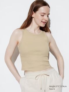 Ribbed Cropped Sleeveless Bra Top | UNIQLO US Summer Ribbed Tank Top With Tank Straps, Summer Ribbed Tank Vest, Ribbed Tank Vest For Summer, Fitted Seamless Tank Top For Spring, Ribbed Camisole Tank Top For Summer, Summer Ribbed Camisole Tank Top, Versatile Ribbed Summer Tank Top, Basic Sleeveless Crop Top For Everyday, Versatile Beige Tank Top For Everyday