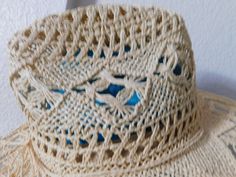 Natural fiber sunhat with ribbon Crocheted Can be packed when travel Shape can be manipulated Condition is great - very clean One size fits all Adjustable Lightweight Cream Crochet Hat, Adjustable Woven Crochet Hat In Beige, Summer Crochet Hat In Cream, Cream Wide Brim Woven Hat, Cream Summer Crochet Hat, Cream Crochet Hat For Beach, One Size Fits Most, Cream Crochet Beach Hat One Size Fits Most, Summer Woven Beige Hat Bands, Cream Crochet Hat For Beach