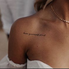 a woman with a tattoo on her shoulder that says, i love you so much