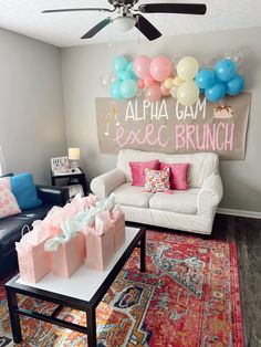 a living room filled with furniture and balloons