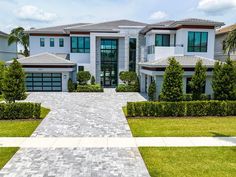 a large white house with lots of windows