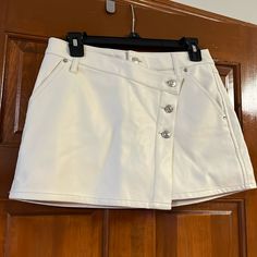 Brand New Without Tags. One Flaw On Top Button See Last Picture. This Is Not Noticeably At All When Buttoned! White Mini Skirt With Buttons, White Mini Skirt With Buttons For Work, White Mini Skirt With Button Closure For Work, White Button Closure Mini Skirt For Work, White Buttoned Mini Skirt For Work, White Casual Mini Skirt With Buttons, Casual White Mini Skirt With Button Closure, White Mini Skirt With Button Closure For Spring, High Waist White Skirt With Button Closure