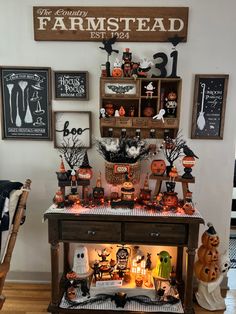 a table topped with lots of halloween decorations