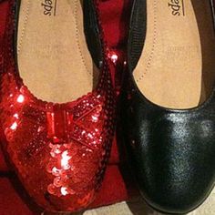 pair of black and red shoes with sequins on them