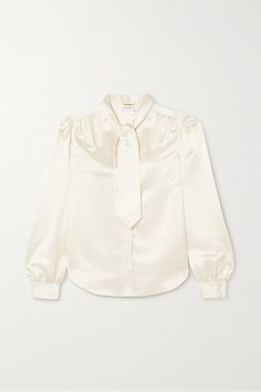 SAINT LAURENT's blouse is made from cream silk-charmeuse with a classic pussy-bow neck tie, which can be looped into a bow or worn loose. It's cut for a slightly loose fit with gently puffed sleeves and gathered cuffs. Layer yours under one of the brand's tailored blazers. Ysl Dresses, Build Wardrobe, Ysl Dress, Saint Laurent Collection, Cream Silk Blouse, Dressy Hats, Silk Chiffon Blouse, White Silk Blouse, Work Fits