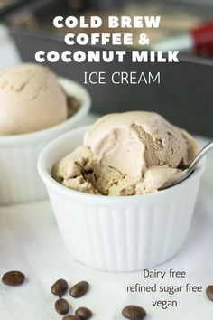 two bowls filled with ice cream next to coffee beans