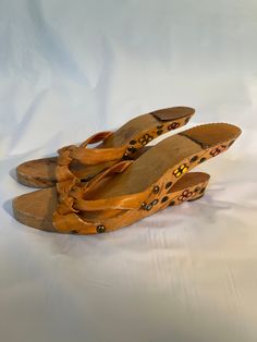 Vintage unusual wooden slides with open heel.  Flowers decorate the wood.  Leather upper shows some wear as well as the sole. Red Velvet Shirt, White Cheongsam, Velvet Shirt, Slip And Slide, Most Beautiful Dresses, Open Toed Heels, Slides Sandals, Slingbacks, Leather Coat