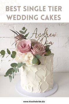 a white wedding cake with pink flowers and greenery on top that says best single tier wedding cakes