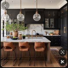 a kitchen with black cabinets, marble counter tops and pendant lights hanging from the ceiling