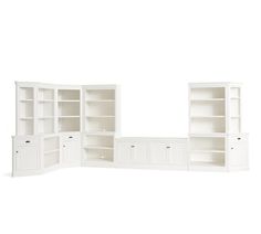 an empty white bookcase with shelves and cupboards