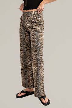 seriously step up your style game with these leopard print denim pants with front pockets. designed with a flattering fit and flared silhouette, these pants feature functional front pockets that add a practical touch to this bold fashion statement. perfect for both casual days and nights out, these pants are a versatile addition to your wardrobe. for an even more bold statement, pair them with the matching leopard print vest, sold separately, to create a coordinated ensemble that’s sure to turn Printed Denim Pants, Flared Denim, Print Denim, Printed Denim, Denim Flares, Romper With Skirt, Bold Fashion, Dress Romper, Hat Hairstyles