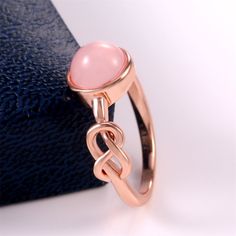 Sweet Pink Round Opal Refine Trendy Weave Rose Gold Rings For Women, Pd176 Stone: Cubic Zircon Material: Rose Gold Plated Brass Attractive Packaging Buy Any 2 Items For $25 (Make Bundle) 100% Brand New Thank You! Rose Gold Bridal Jewelry, Infinity Knot Ring, Gold Rings For Women, Gold Moonstone Ring, Rose Gold Rings, Pink Round, Infinity Ring, Zircon Ring, Engagement Bands