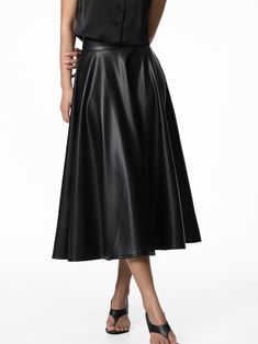 Vegan leather skirt in midi length with flared bottom. A Line style. Model is in MINUSEY ONE SIZE. ✔️ Free worldwide express shipping over $100✔️ Loved by 6,500+ customers✔️ Limited edition collections, maximum style⠀⠀⠀⠀⠀⠀⠀⠀⠀Stay ahead of the trend with can’t-find-anywhere-else staples. Your closet will thank you 💕 * MINUSEY ONE SIZE = EU 34-38, US 2-6* 100% PU Leather* Dry clean* Made in Korea - Model Height: 172cm/5'7" (US2, EU34) Knee-length Faux Leather Bottoms For Spring, Spring Knee-length Faux Leather Bottoms, Fitted Flared Leather Skirt, Fitted Leather Flared Skirt, Formal Flared Leather Skirt, Formal Leather Flared Skirt, Party Leather Pleated Skirt, Leather Midi Skirt With Lining, Leather Lined Midi Skirt