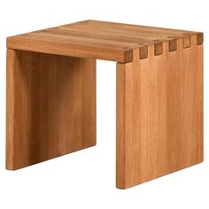 a small wooden table with four sections on each side and one section at the top