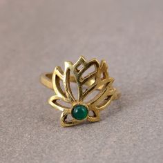 Gold Lotus Ring, Spiritual Jewelry, Boho Gold Lotus Ring, Padma Ring, Flower Ring, Dainty Ring, Gift For Her, Gift item, Rings For Women Gemstone: - green onyx Jewelery Category:- Handmade Ring Metal:- Brass -- T H E * Q U A L I T Y We buy raw gemstones directly from miners and then get them cut and polished at our workshop , Therefore saving some bucks (additional added fees and markups) avoiding a middle man and making sure of the authenticity of the gems. And we use top quality materials that are water safe (ideally) However it is highly recommended to avoid water since doing so will prolong the durability and quality of your jewelry. Also, we recommend avoiding contact with chemicals such as bleach, perfume and sunscreen because they can damage the material over time which will affect Lotus Gold Ring, Lotus Jwellary, Lotus Locket Gold, Lotus Inspired Jewellery, Lotus Ring, Middle Man, Gold Lotus, Ring Flower, Spiritual Jewelry