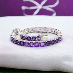 Natural Amethyst Bracelet, Amethyst Tennis Bracelet, 925 Sterling Silver, Amethyst Jewelry, February Birthstone, Gift For Her, Women, Wife. PRODUCT CODE --- GSBR-001 STONE --- NATURAL AMETHYST GEMSTONE BIRTHSTONE --- FEBRUARY METAL --- 925 STERLING SILVER PRODUCTS TYPE --- BRACELET STONE DIMENSION --- 6X4MM Amethyst Benefits- * A gorgeous purple gemstone, the Amethyst is said to bring strength, courage, and peace to the wearer. * These benefits can help promote healing. * It's a soothing stone w Sterling Silver Cubic Zirconia Gemstone Bracelet, Elegant Purple Round Crystal Bracelet, Elegant Round Purple Crystal Bracelet, Tennis Bracelet With Gemstone Accents As Gift, Gift Tennis Bracelet With Gemstone Accents, Crystal Gemstone Bracelet For Anniversary, Anniversary Crystal Gemstone Bracelet, Anniversary Amethyst Gemstone Tennis Bracelet, Purple Fine Jewelry Bracelet