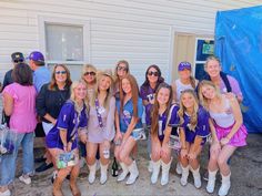 a group of young women standing next to each other