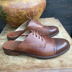 Angela Scott Oxford Brogue Loafer Slides Brown Size 11. Totally On Trend For This Season! Slight Heal (Just Under An Inch.) Lace-Up. Slight Intentional Color Contrast Between The Shoe Base And Tips. In Excellent Condition - A Small Amount Of Wear In The Heals, Otherwise Extremely Clean Throughout. Thank You For Shopping My Closet. I Search For Special, Unique, And Rare Items To Accent Your Wardrobe And Home, Bringing Them To You At Prices That Make Them Accessible. As A Trained Photographer, To Shoe Base, Loafer Slides, Office Of Angela Scott, I'm Not Perfect, Rare Items, Oxford Brogues, Great Lengths, Color Contrast, Not Perfect