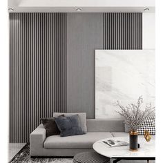 a living room filled with furniture and walls covered in striped wallpaper, next to a white coffee table