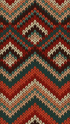 an abstract knitted pattern in red, green and blue colors with zigzag stripes