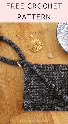 the free crochet purse pattern is shown on a wooden table with other items