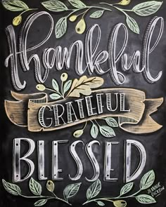 a chalkboard sign with the words grateful, grateful and blissed written on it