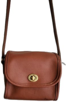 Classic Saddle Bag With Adjustable Strap For On-the-go, Classic Soft Leather Saddle Bag For On-the-go, Classic Crossbody Saddle Bag For On-the-go, Classic Everyday Saddle Bag For Fall, Classic Everyday Crossbody Saddle Bag, Classic Saddle Bag For Daily Use In Fall, Classic Flap Shoulder Bag For Fall, Classic Fall Shoulder Bag With Flap, Classic Cognac Soft Leather Flap Bag