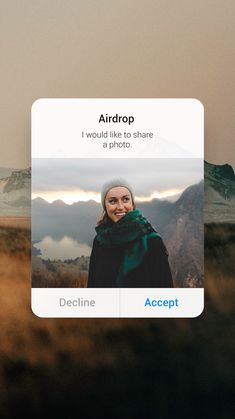 an iphone photo with the airdrop button open and someone's name on it