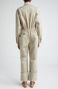 An abundance of pockets and darted knee patches amplify the workwear-inspired look of this slim-fitting jumsuit crafted of cotton stretch gabardine. Hidden-zip half-placket Point collar Long sleeves with snap cuffs Chest patch pockets; front patch pockets; on-seam patch pockets; back patch pockets Back elastic waist Rolled cuffs 97% cotton, 3% elastane Dry clean or hand wash, line dry Made in Italy Designer Clothing Fitted Cargo Style Overalls And Jumpsuits, Fitted Cargo Style Jumpsuits And Overalls, Fitted Cargo Style Jumpsuits And Rompers, Cotton Overalls With Multiple Pockets For Work, Cotton Jumpsuits With Cargo Pockets For Fall, Utility Overalls With Pockets For Workwear, Utility Jumpsuits And Rompers For Workwear, Cotton Jumpsuits And Rompers With Cargo Pockets For Fall, Fall Cotton Jumpsuits With Cargo Pockets