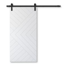 a white door with black hardware on the bottom and an arrow pattern on the side